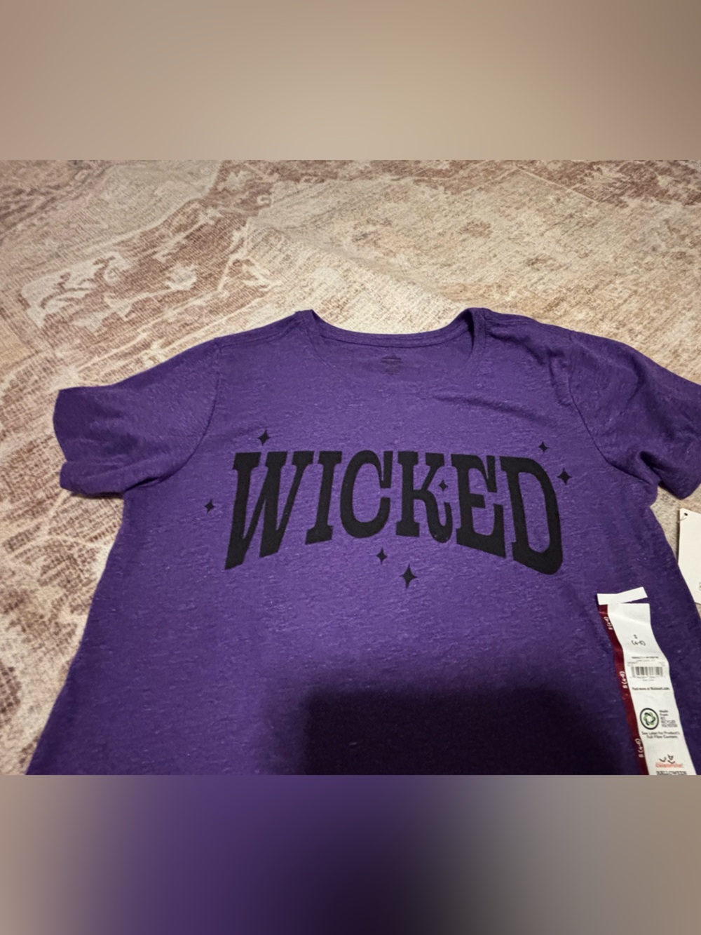 NWT, Purple "Wicked" Graphic women’s Tee
